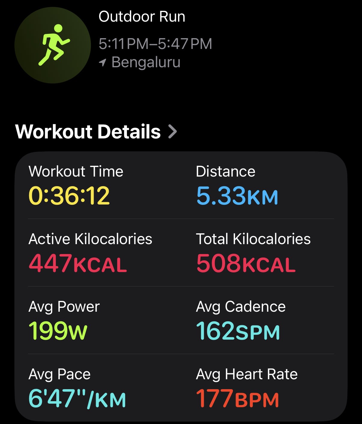 Running stats showing a 5K outdoor run near the lake in Bangalore