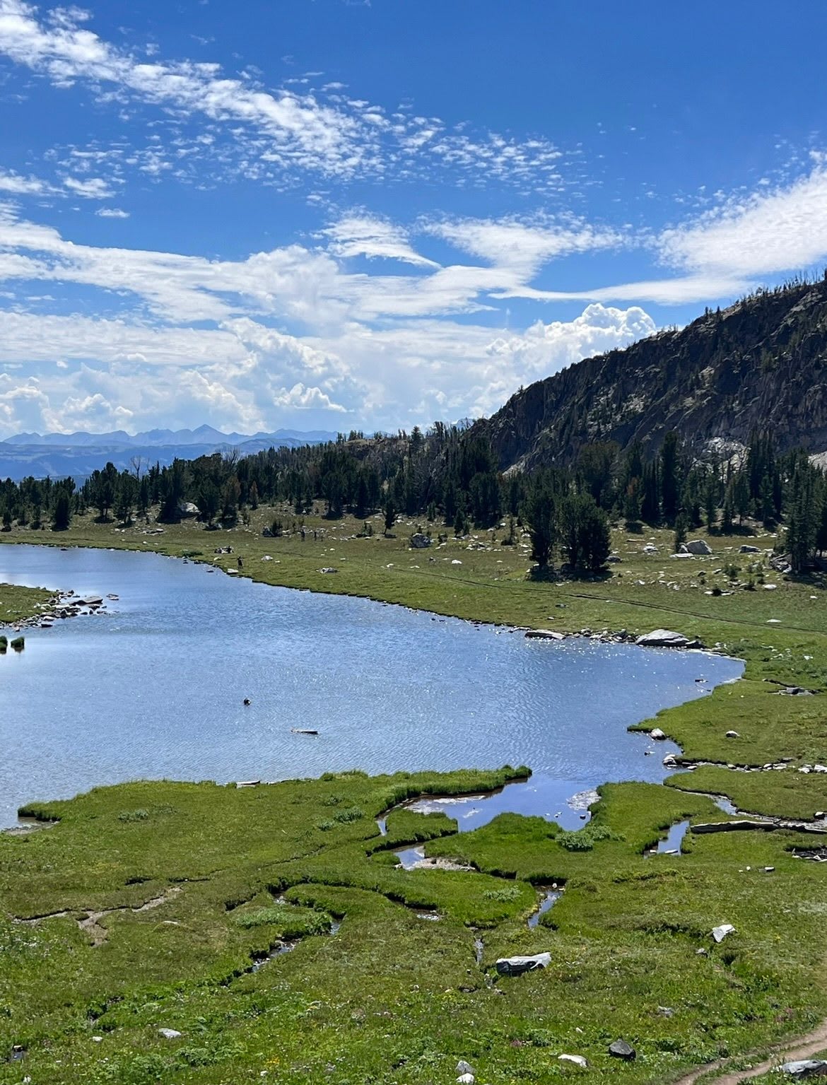 Alpine lake at the top of the Beehive Basin Trail near Big Sky