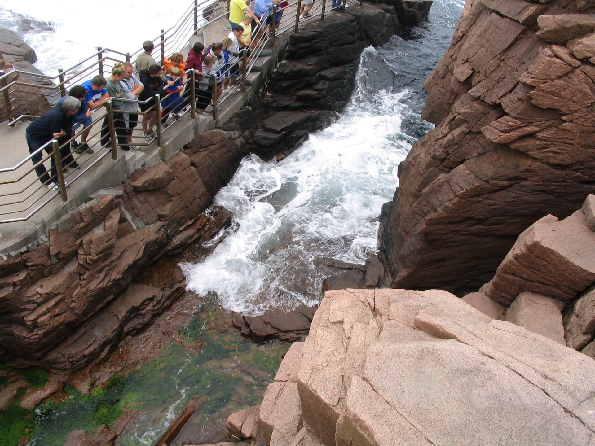 Waves crashing into the rock inlet of Thunder Hole in Acadia National Park