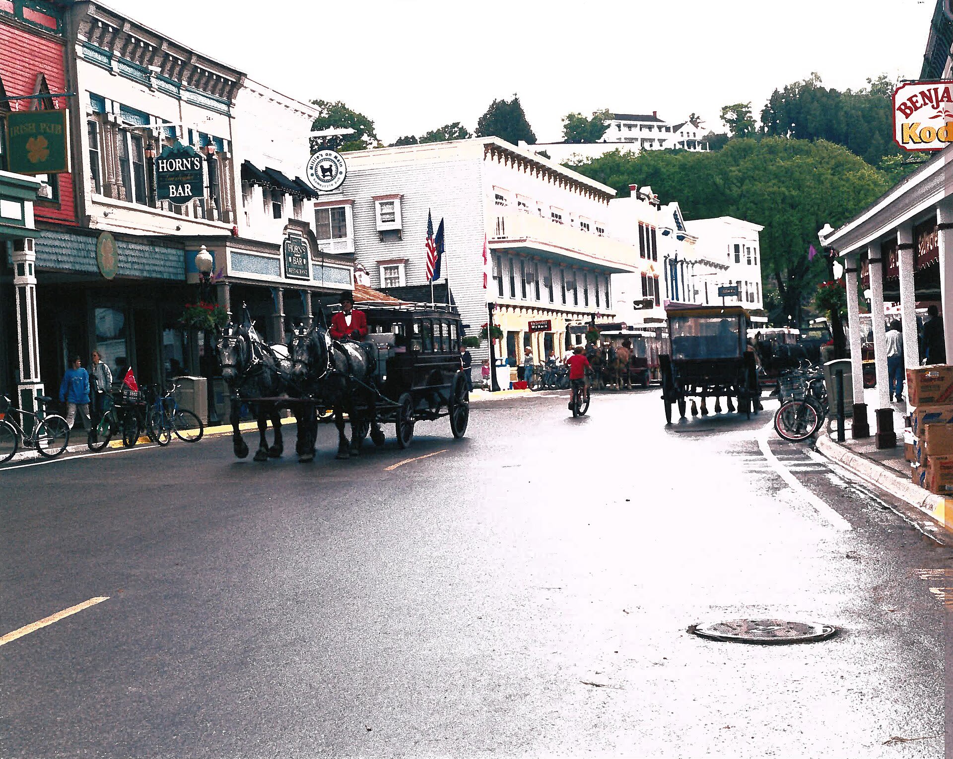 Main Street on Mackinac Island, where horse-drawn carriages and bicycles replace cars