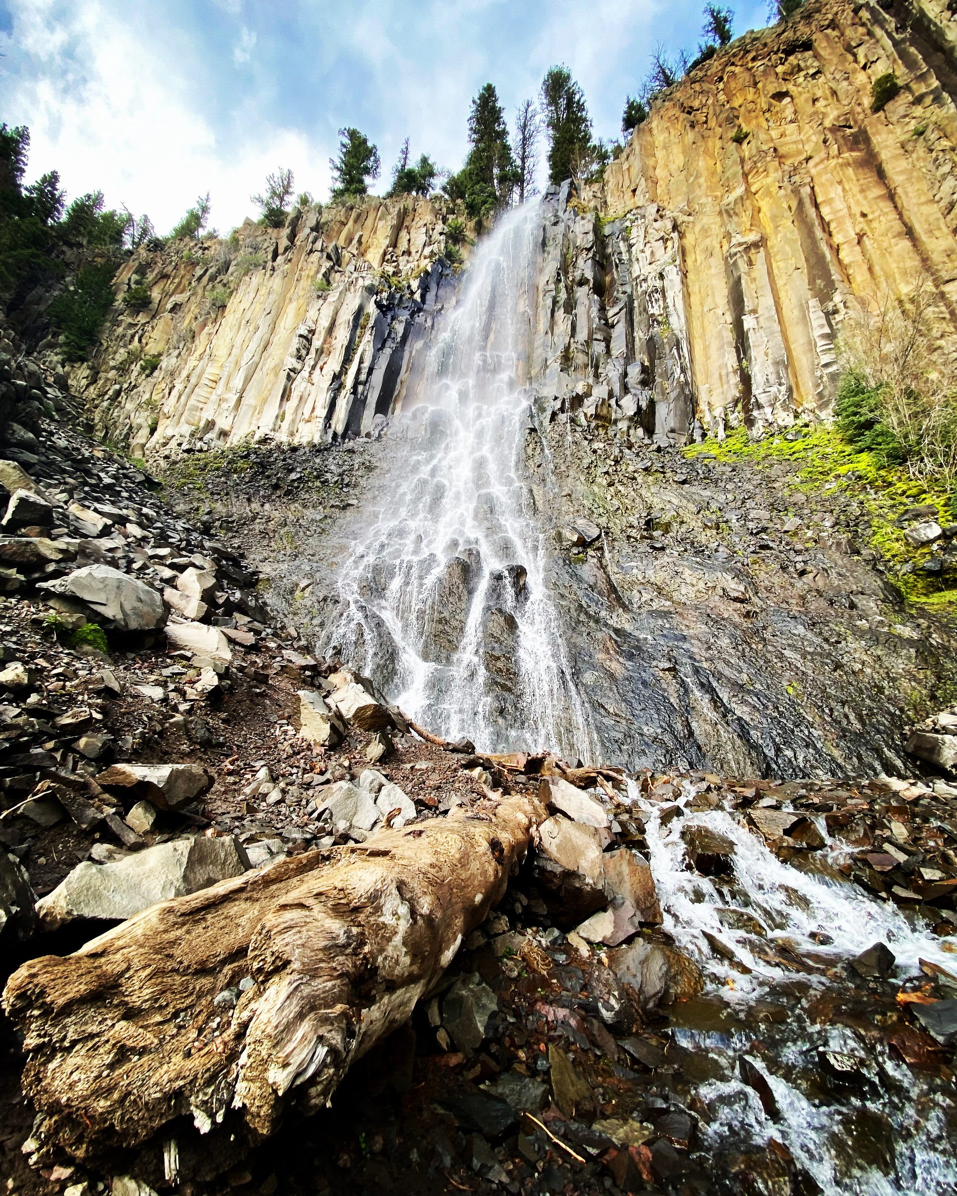 Palisade Falls cascading over columnar basalt cliffs in Hyalite Canyon, south of Bozeman