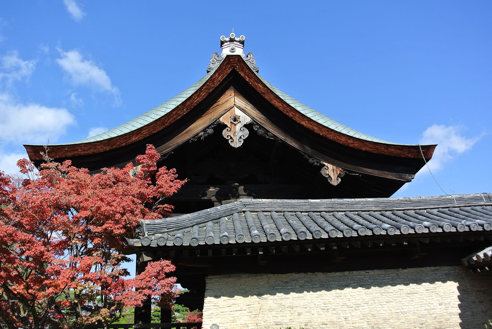Autumn leaves turning orange and red in Kyoto