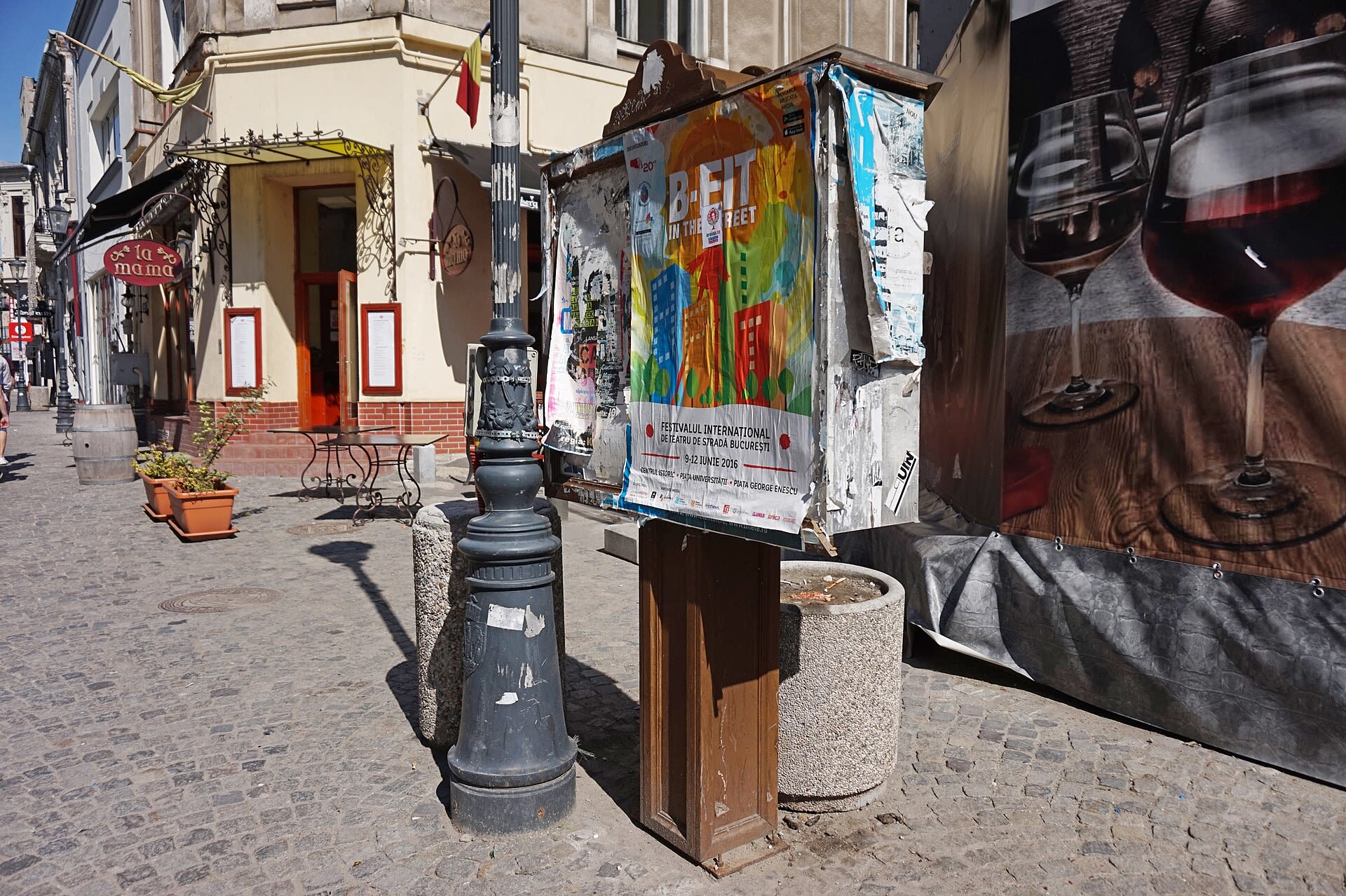 Historic old town district of Bucharest with cafe terraces and 19th-century buildings
