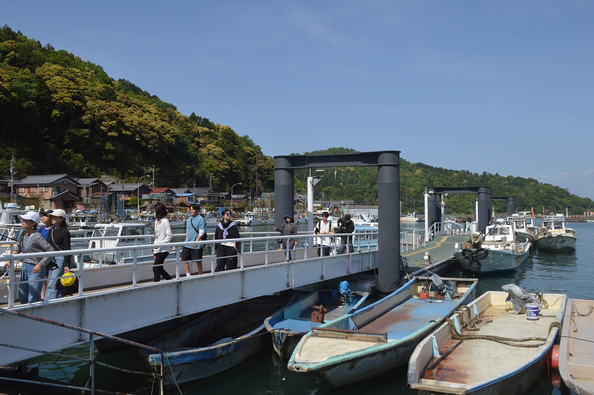 Small boats moored at the harbour of Okishima island on Lake Biwa