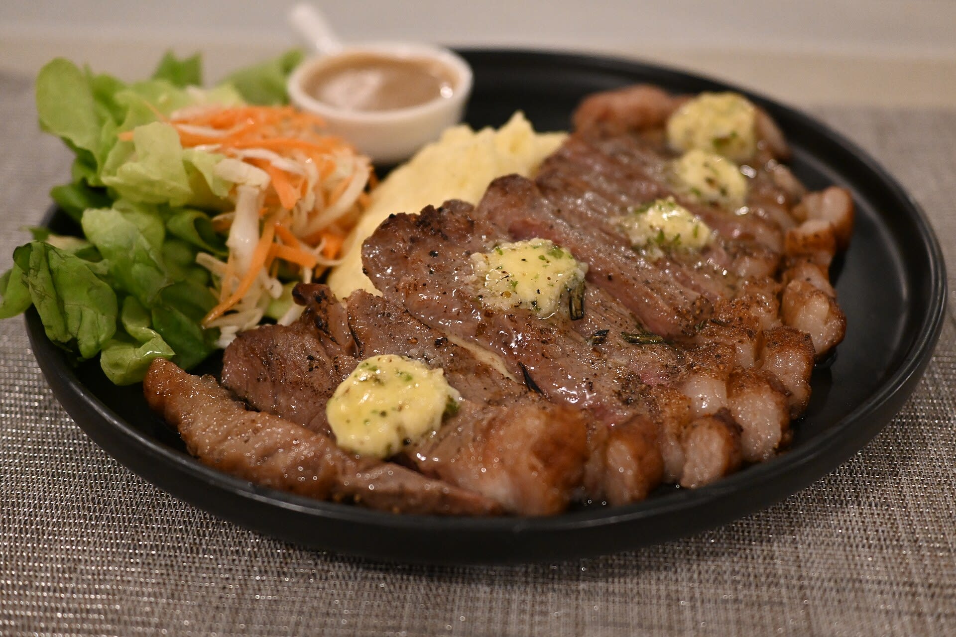 Grilled steak dinner at a restaurant