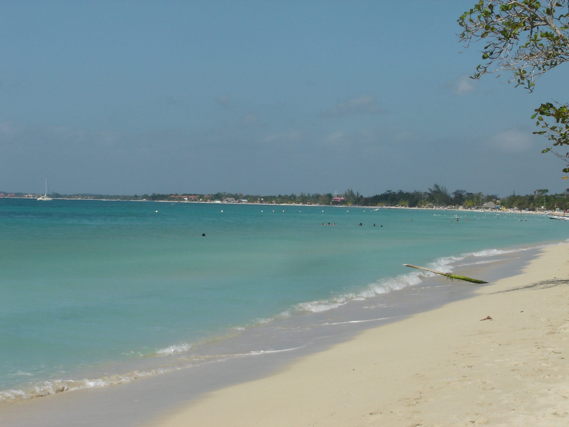 Seven Mile Beach in Negril, with white sand and clear turquoise water