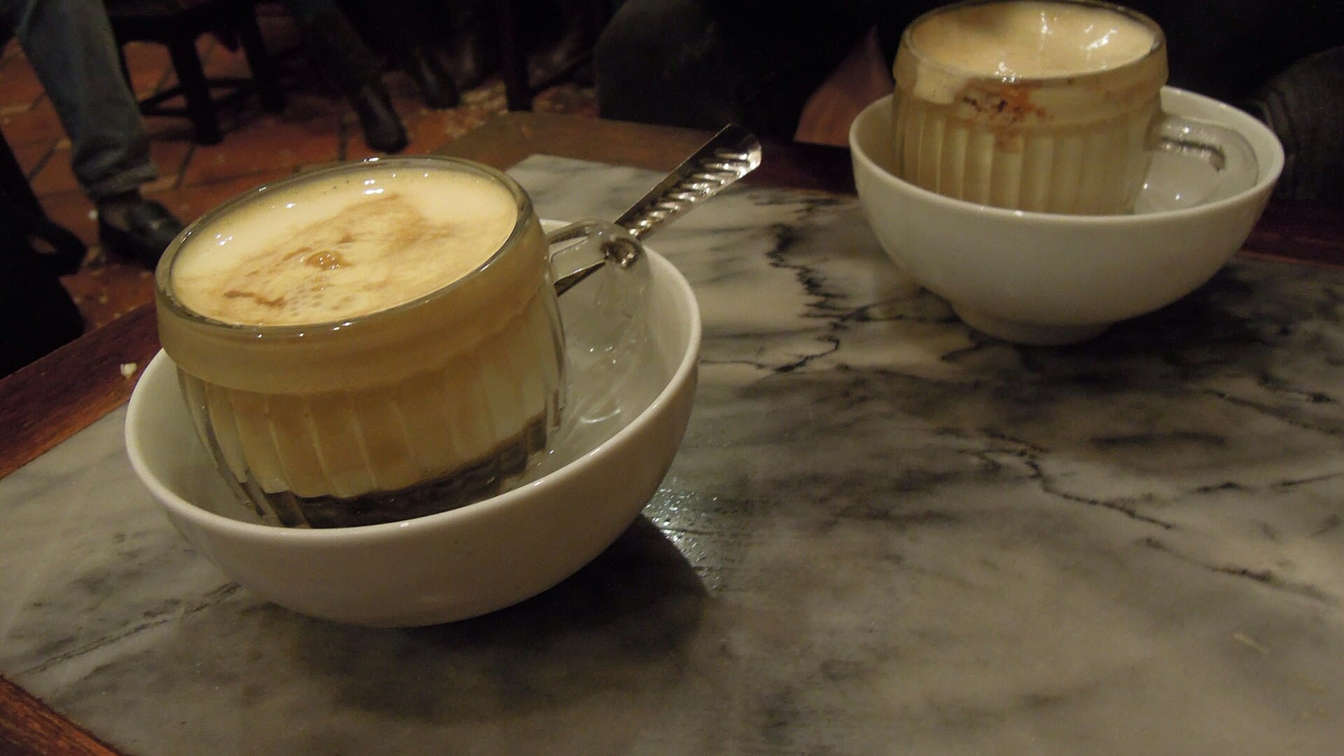 Vietnamese egg coffee topped with frothy egg cream in Hanoi