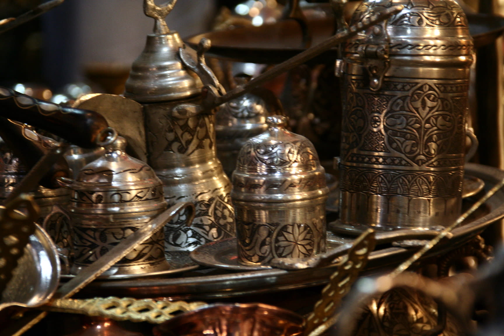 Preparing traditional Turkish coffee in a copper cezve pot