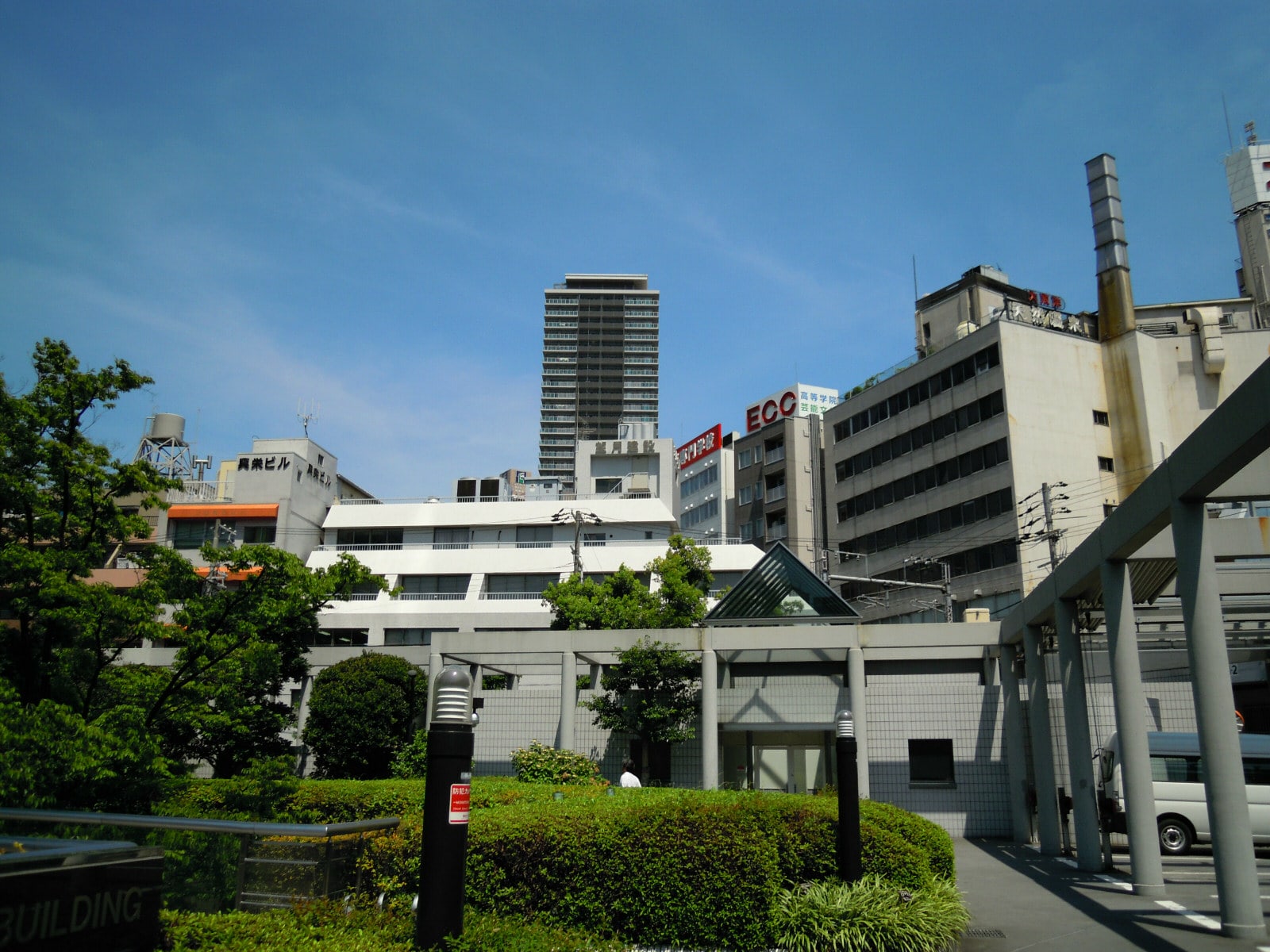 Narrow alleyway lined with small shops and houses in Nakazakicho, Osaka