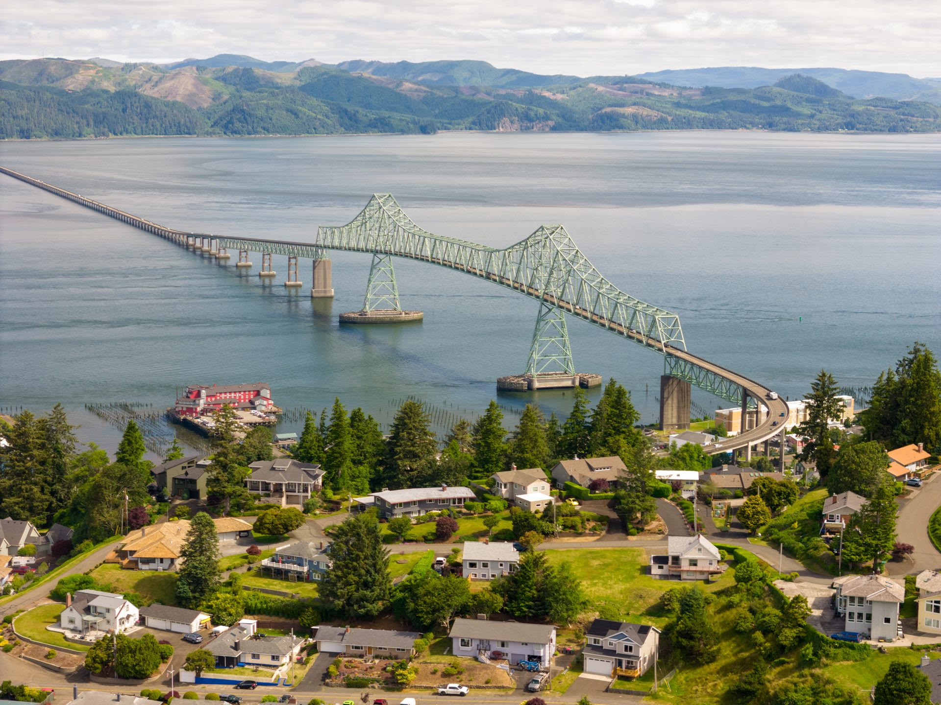 Aerial view of the Astoria-Megler Bridge's cantilever truss span crossing the Columbia River