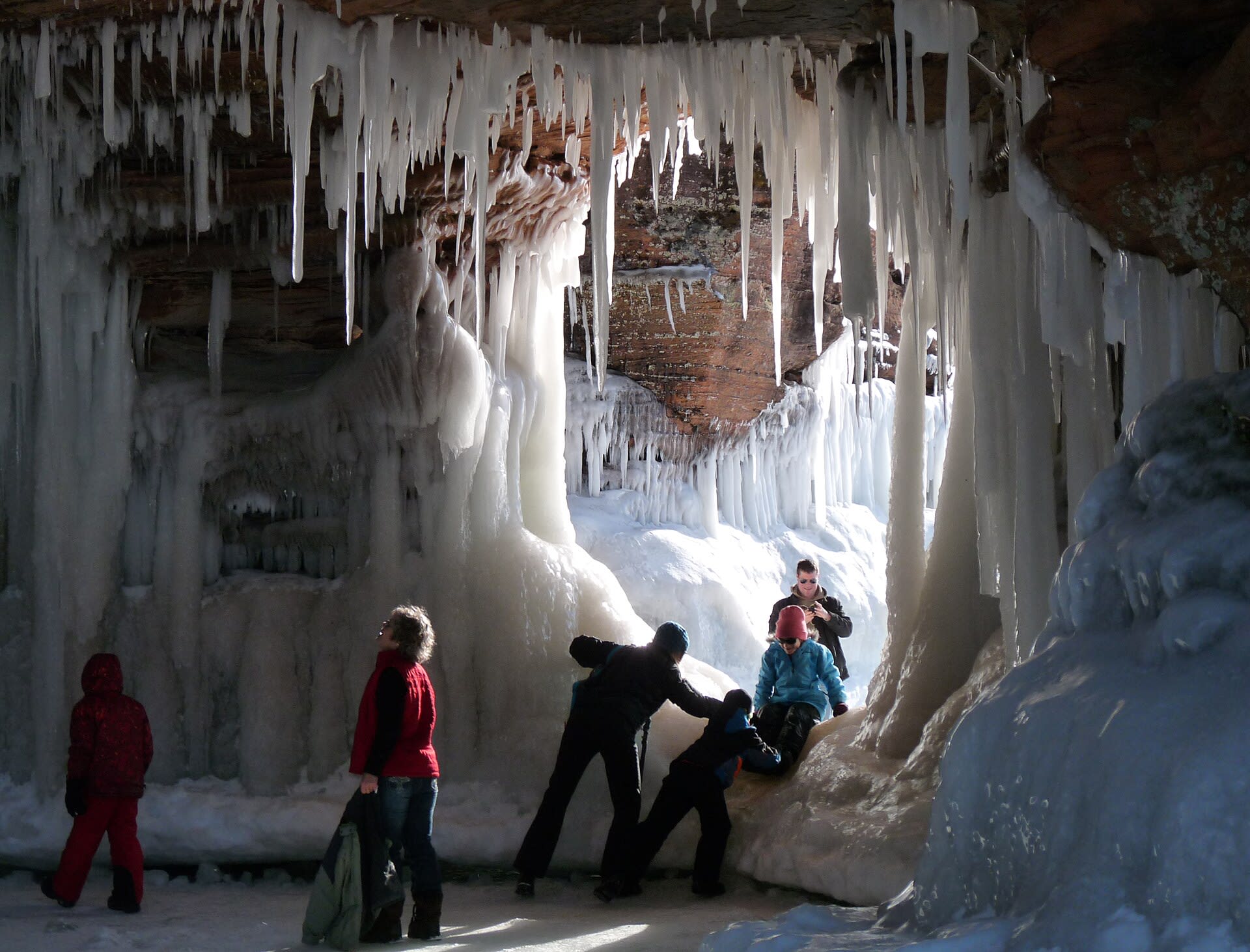 Sea cave along the Apostle Islands shore frozen in winter ice