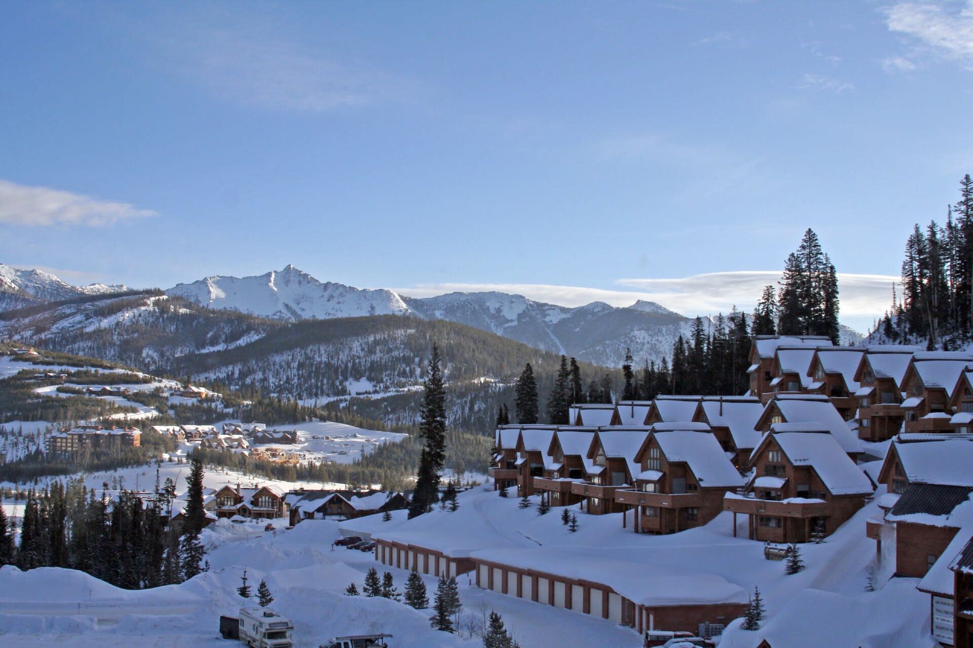Snow-covered ski runs at Big Sky Resort in Montana