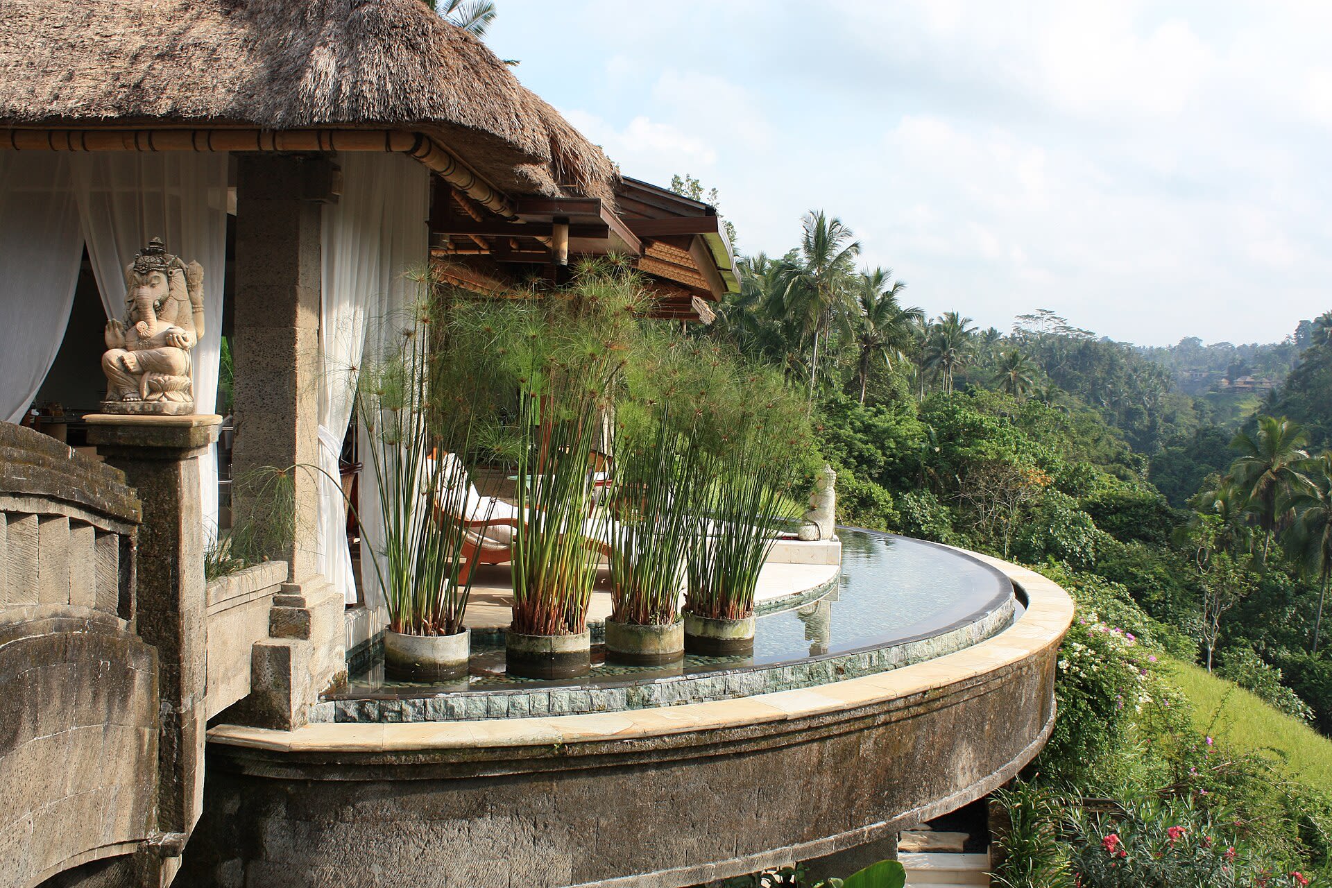 Pool and villa overlooking the Ayung River valley at the Viceroy Bali resort