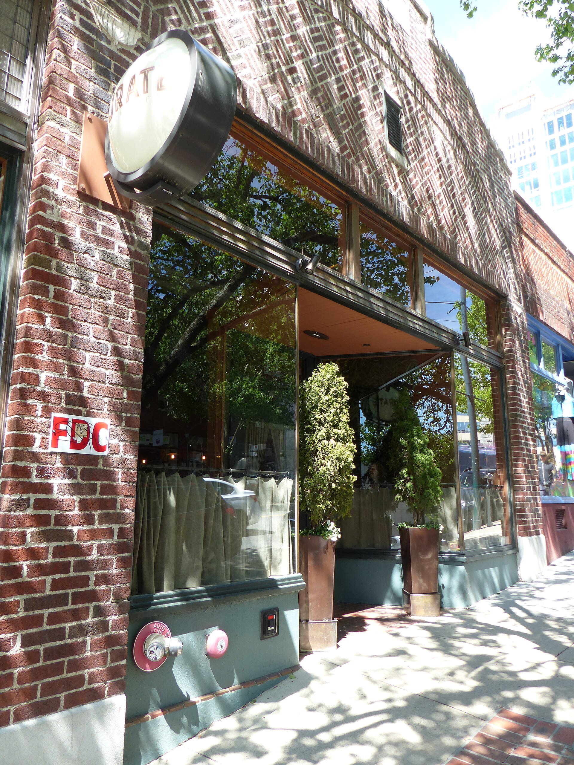 The dining room of Curate Bar de Tapas, a James Beard Award-winning Spanish tapas restaurant in downtown Asheville