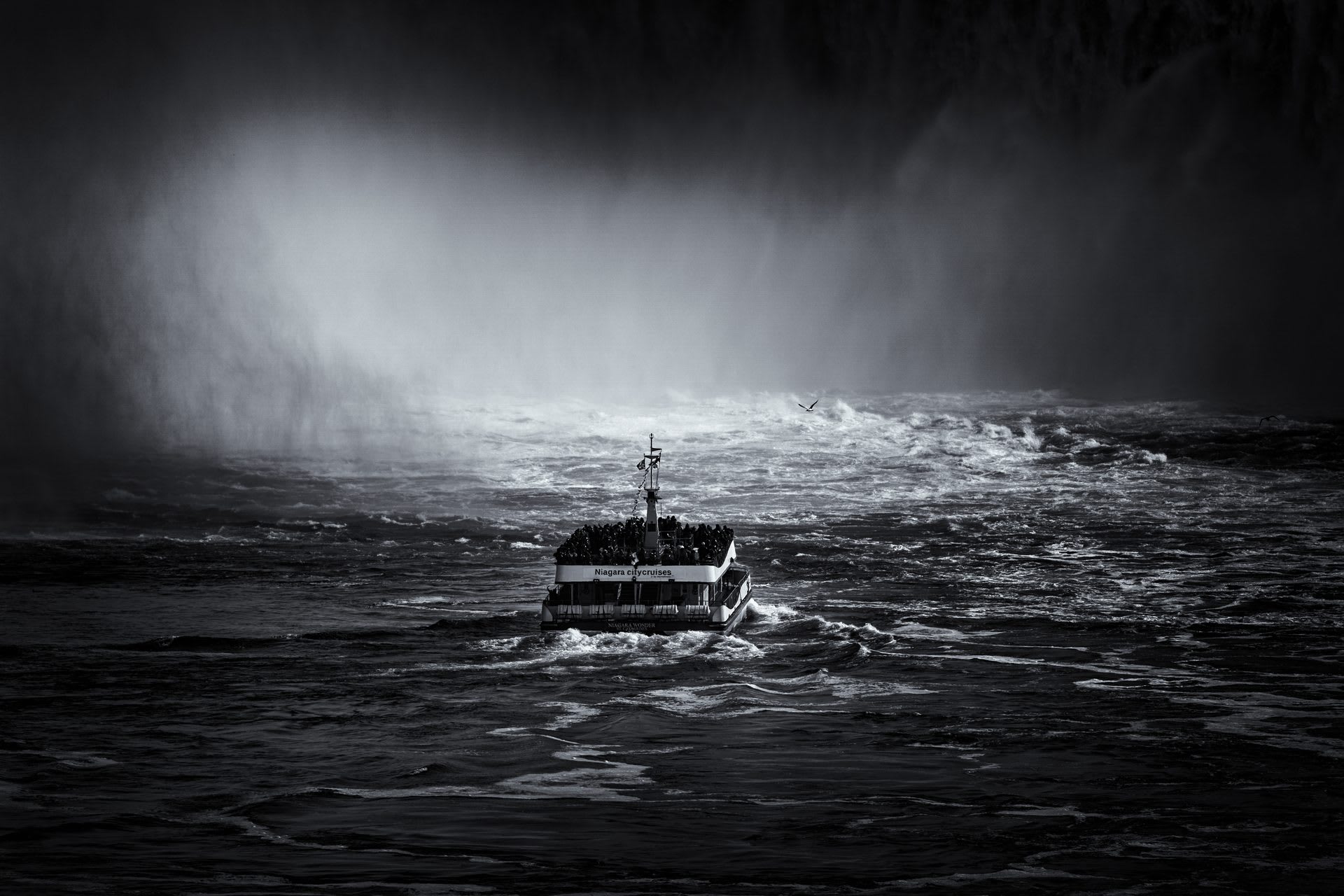 Hornblower Niagara Cruises boat approaching Horseshoe Falls