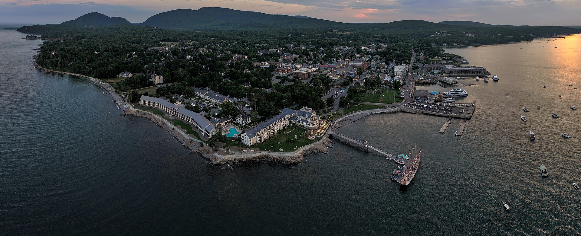 Aerial view of Bar Harbor, Maine at sunset with its waterfront along Frenchman Bay