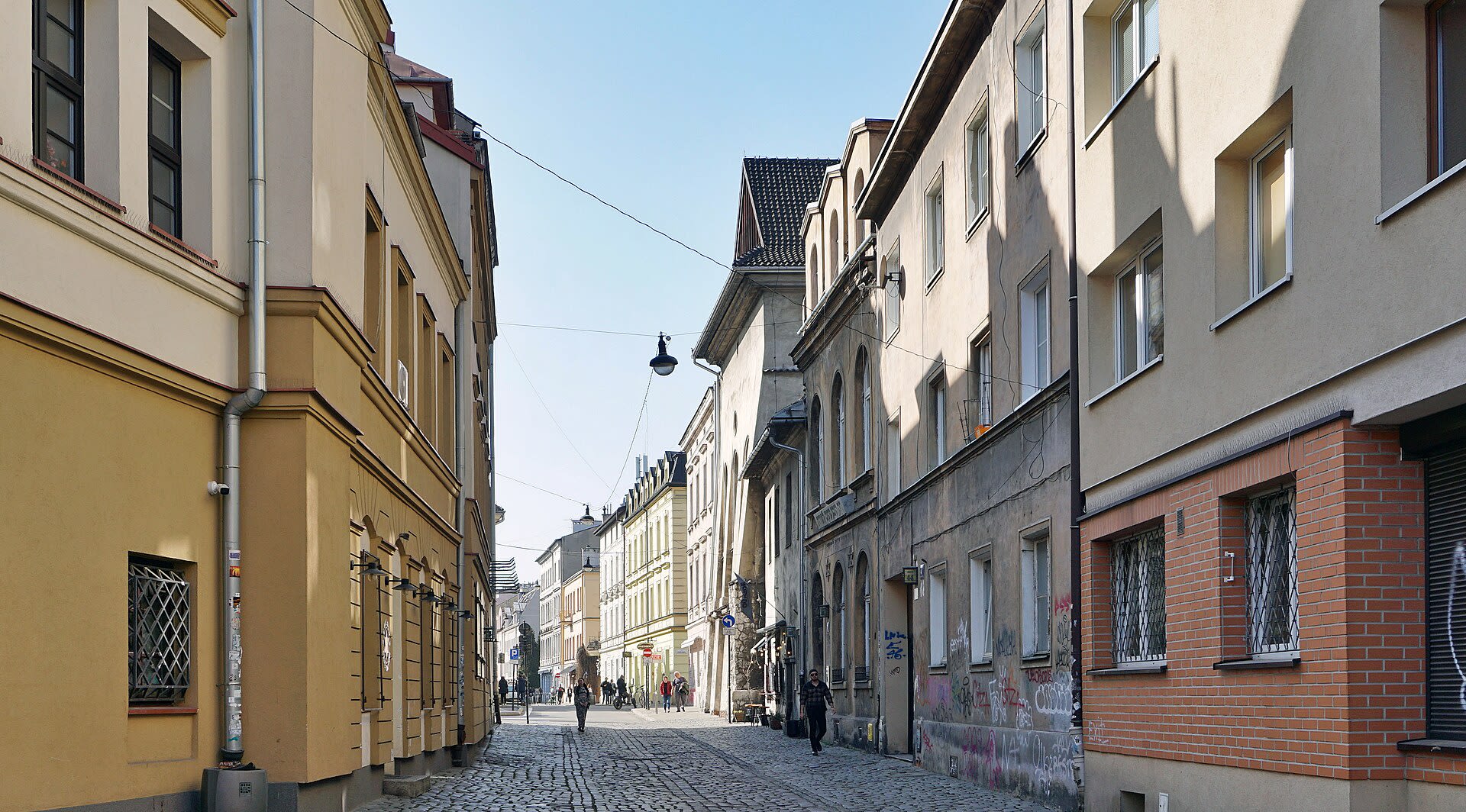 Evening view of Józefa Street in the bohemian Kazimierz district of Krakow