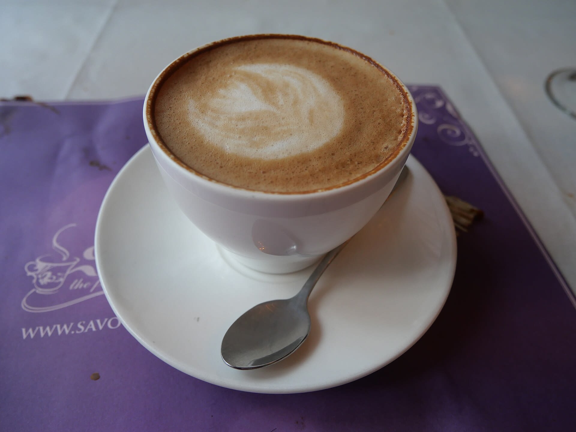 Latte with latte art served at a cafe