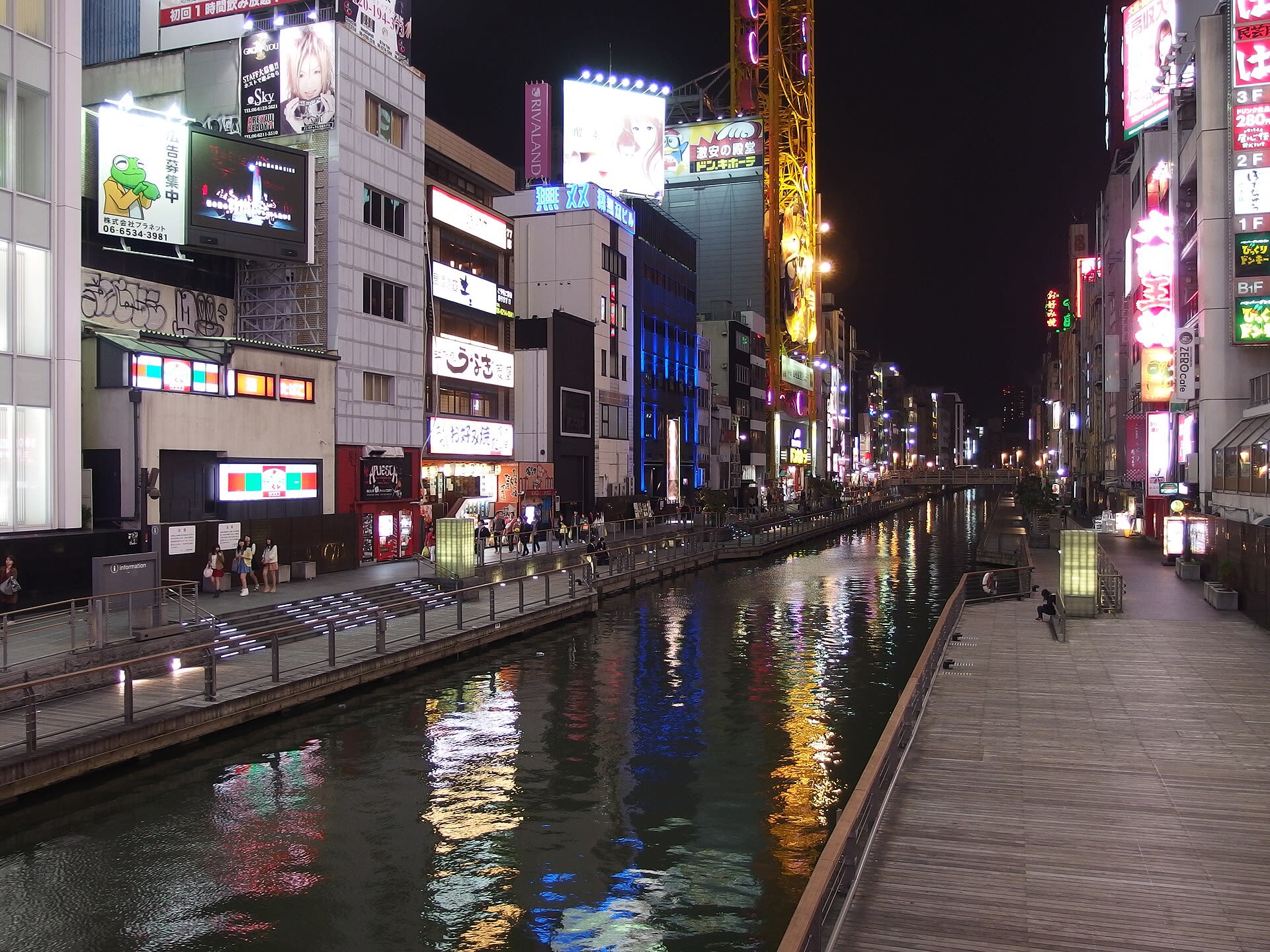 The neon-lit canal and entertainment street of Namba at night
