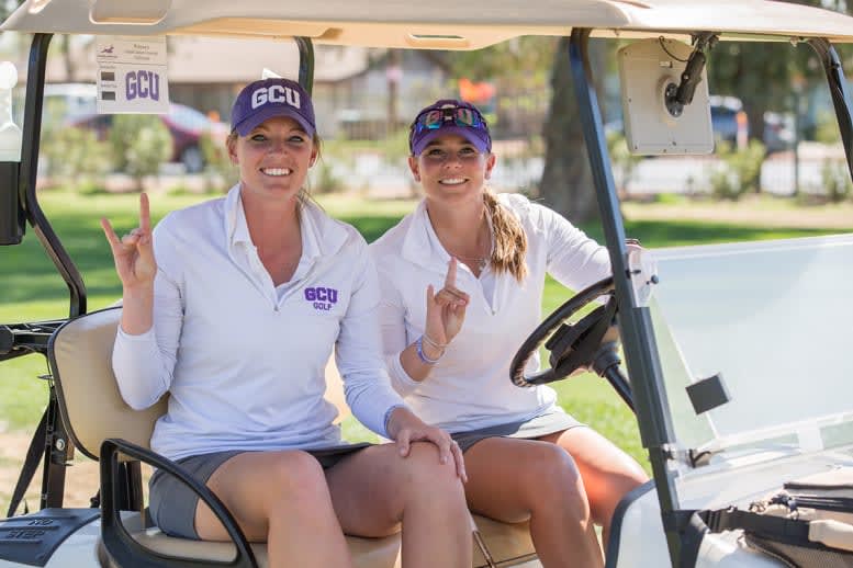 two GCU golfers on a golf course