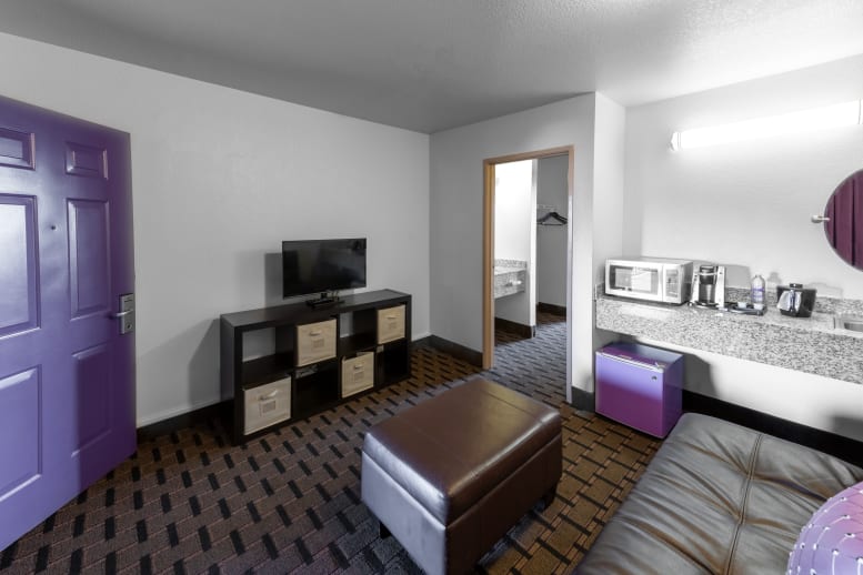 Hotel Suite living area with TV and Couch