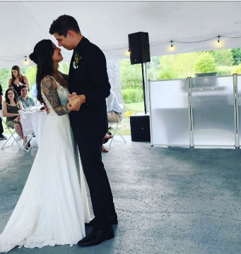 Bride and groom dancing during their wedding reception