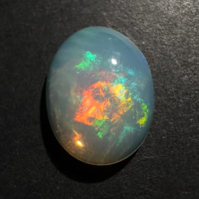 &Auml;thiopischer Opal Farbspiel, Ovaler Cabochon, 12 x 9 x 3 mm, 1,72 ct