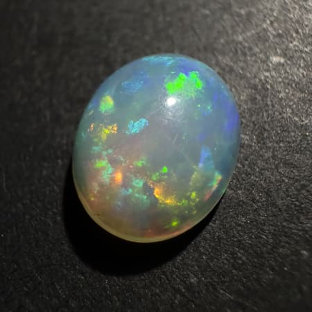 Ethiopian Opal Play of color, Oval Cabochon, 9 x 7 x 4 mm, 1.73 ct
