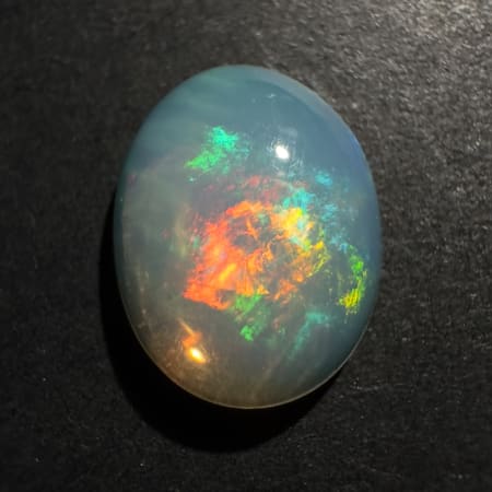 Ethiopian Opal Play of color, Oval Cabochon, 12 x 9 x 3 mm, 1.72 ct