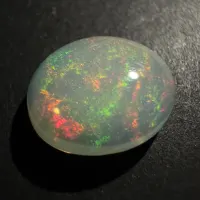 &Auml;thiopischer Opal Farbspiel, Ovaler Cabochon, 11 x 9 x 4 mm, 2,66 ct