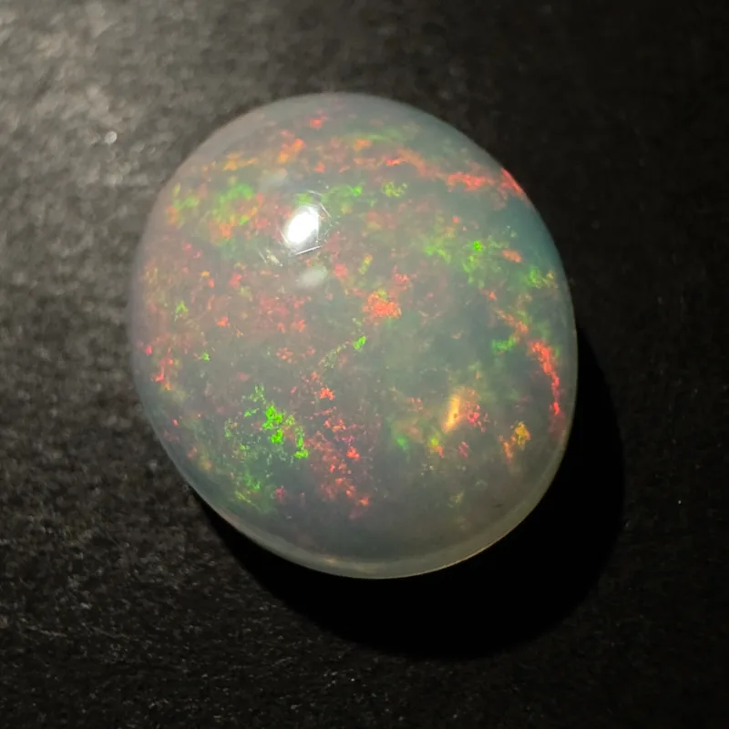 &Auml;thiopischer Opal Farbspiel, Ovaler Cabochon, 11 x 9 x 4 mm, 2,66 ct
