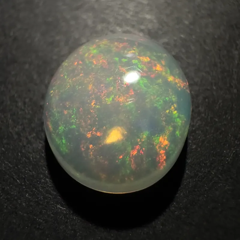 &Auml;thiopischer Opal Farbspiel, Ovaler Cabochon, 11 x 9 x 4 mm, 2,66 ct