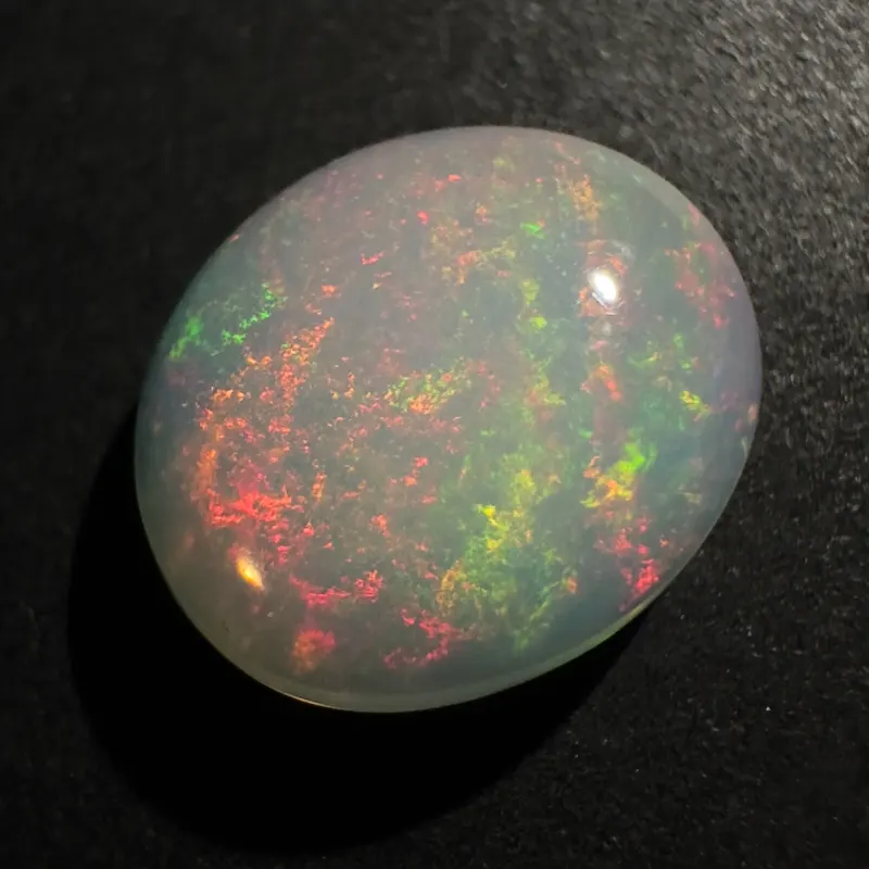 &Auml;thiopischer Opal Farbspiel, Ovaler Cabochon, 11 x 9 x 4 mm, 2,66 ct