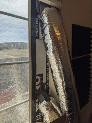 ERV input and output ducts in a window
