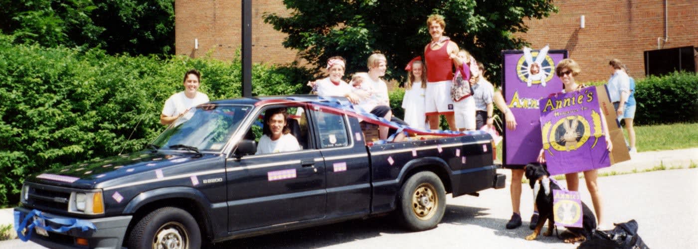The Annie's team piled into the back of a pickup truck, ready to join a parade