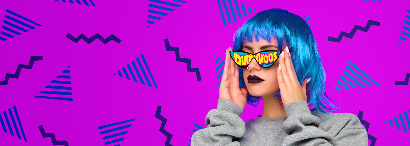 Woman in sunglasses with Dunkaroos written in her lenses