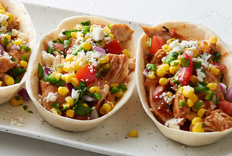 close up of 3 Slow-Cooker Chipotle Chicken Taco Bowls with Corn-Jalapeño Salsa