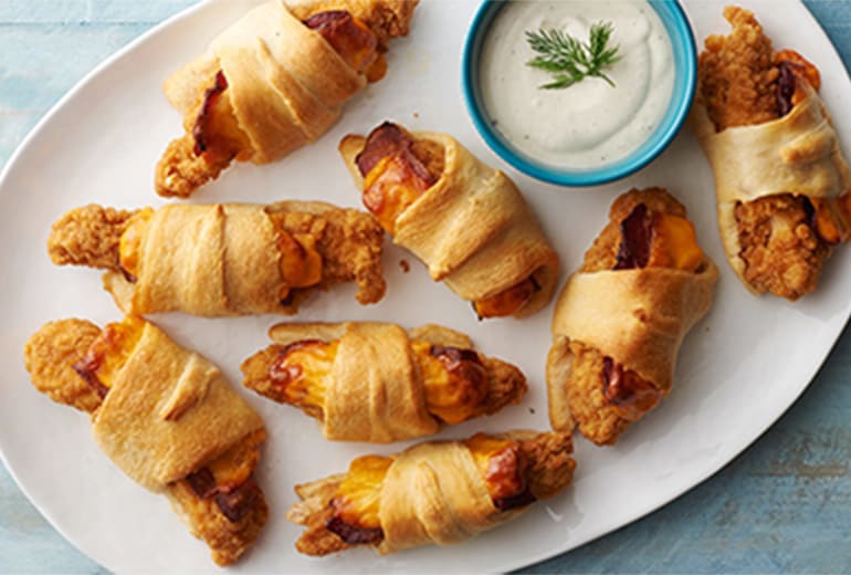 a party tray of chicken bacon ranch crescent roll ups