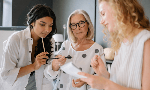 Illustration celebrating International Women’s Day, featuring diverse women standing together with symbols of empowerment, education, and career opportunities.