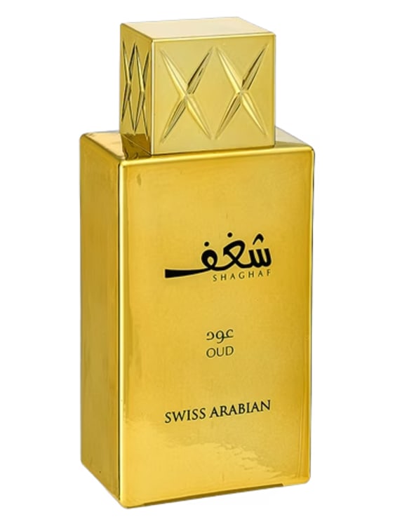 A photograph of a luxurious bottle of Swiss Arabian Shaghaf Oud with a dark wooden cap and intricate golden designs.