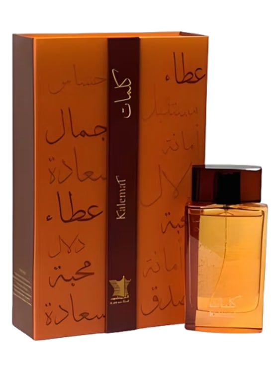 A sleek black bottle of Arabian Oud Kalemat perfume with intricate golden patterns.
