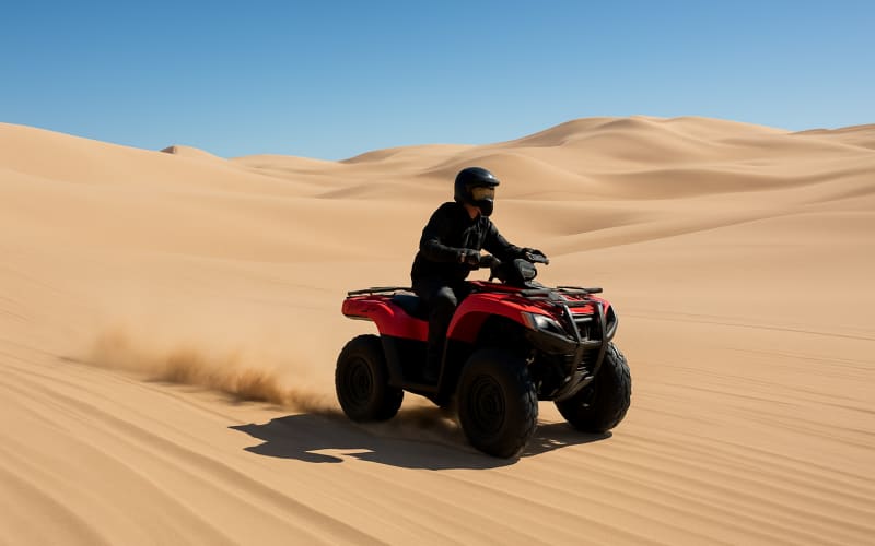 ATV riding over the expansive sand dunes of Oregon Dunes National Recreation Area