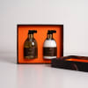 Benjamin Barber hand wash and lotion set in a brown gift box with orange interior, includes two pump bottles.