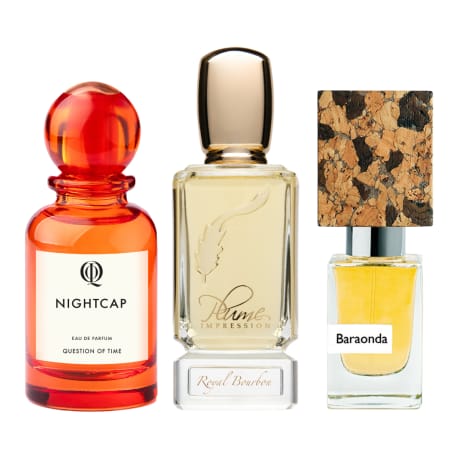 Nightcap eau de parfum by Question of Time in orange bottle, Plume Impression Royal Bourbon in clear bottle, Baraonda in cork-topped bottle.
