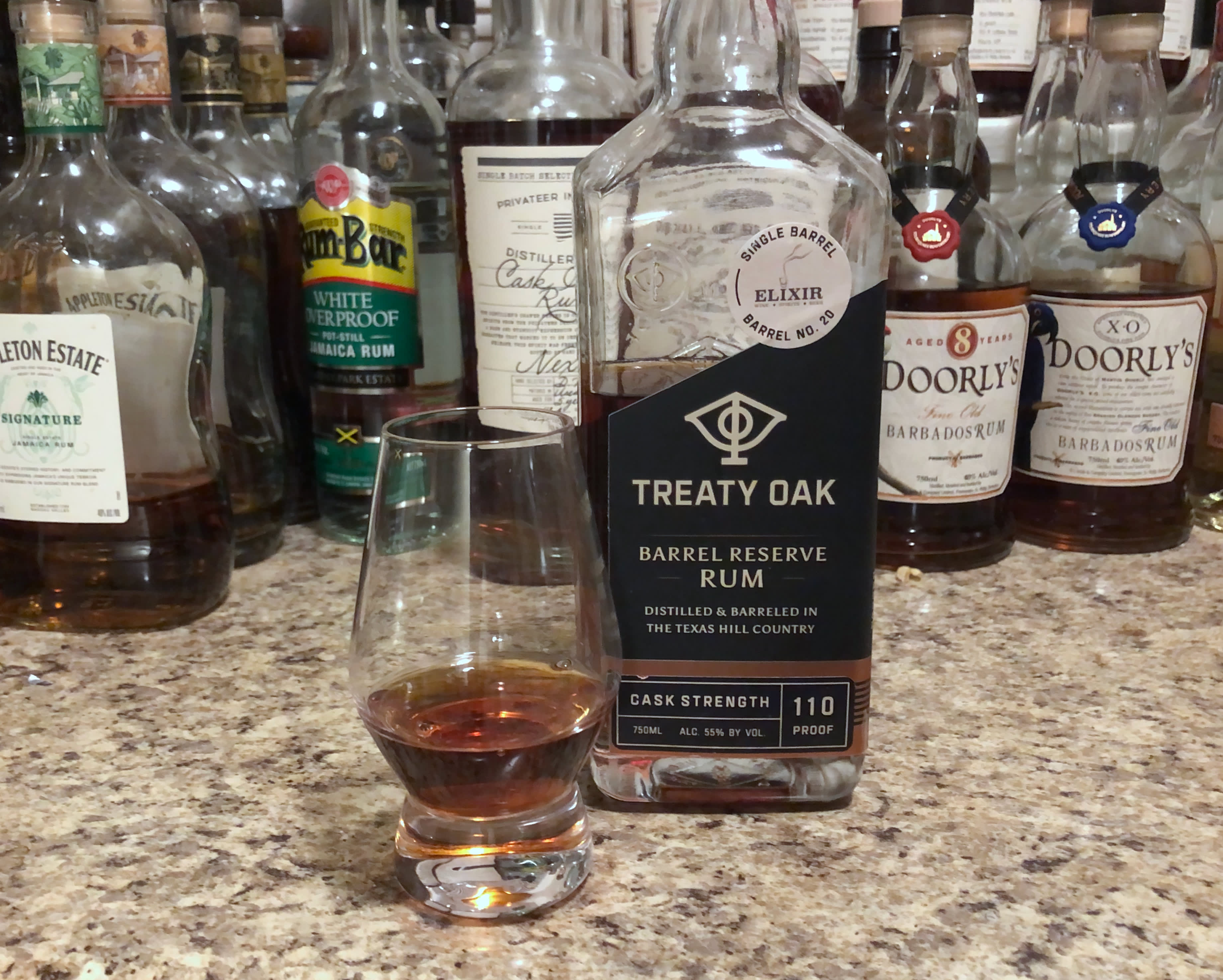 Bottle of Treaty Oak rum sitting on a countertop