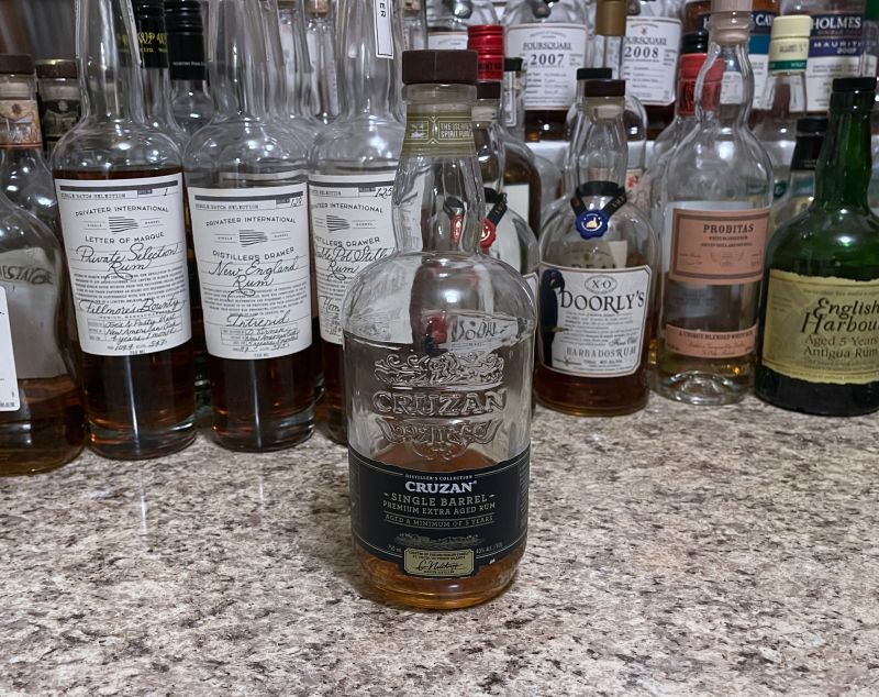 A bottle of Cruzan Single Barrel rum on a kitchen counter