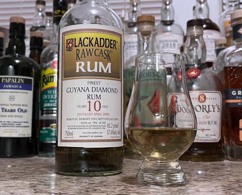 Blackadder Raw Cask Guyana Diamond 10 year bottle next to a glass of rum