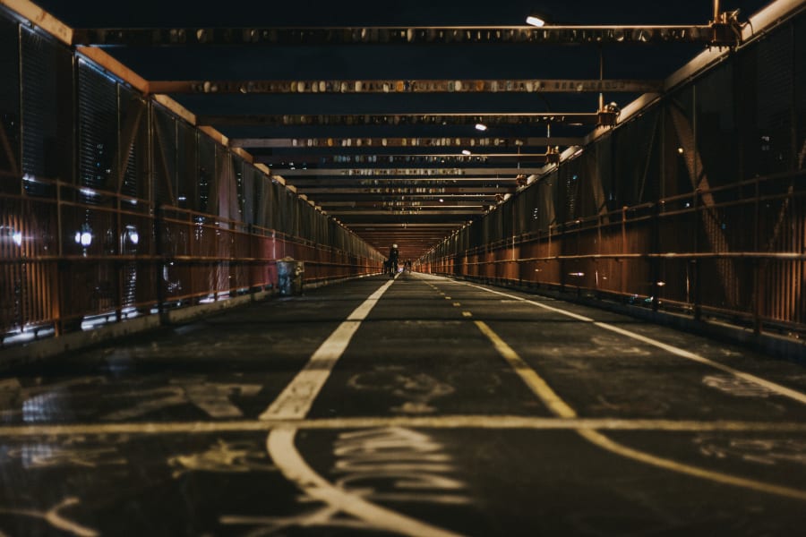 Bike lanes across the Williamsburg Bridge at night