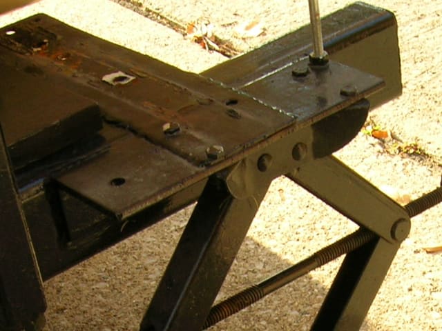 Jack bolted to angle iron