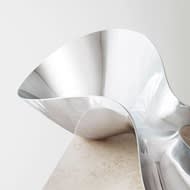 Still life image of the mirror stainless steel 1041 Henning Koppel masterpiece